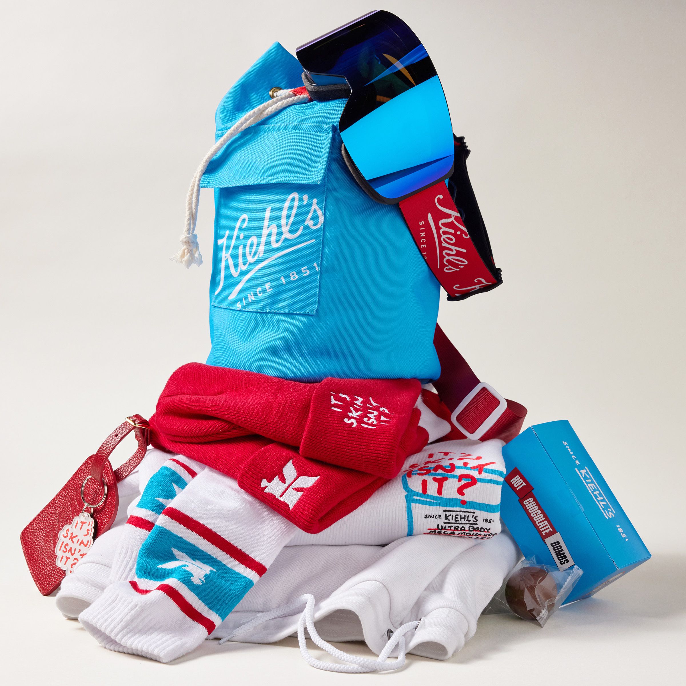 Branded merchandise created by Twelve for Kiehl's; Custom branded and designed ski apparel, backpack, beanie, socks, ski mask, keychain, and packaging