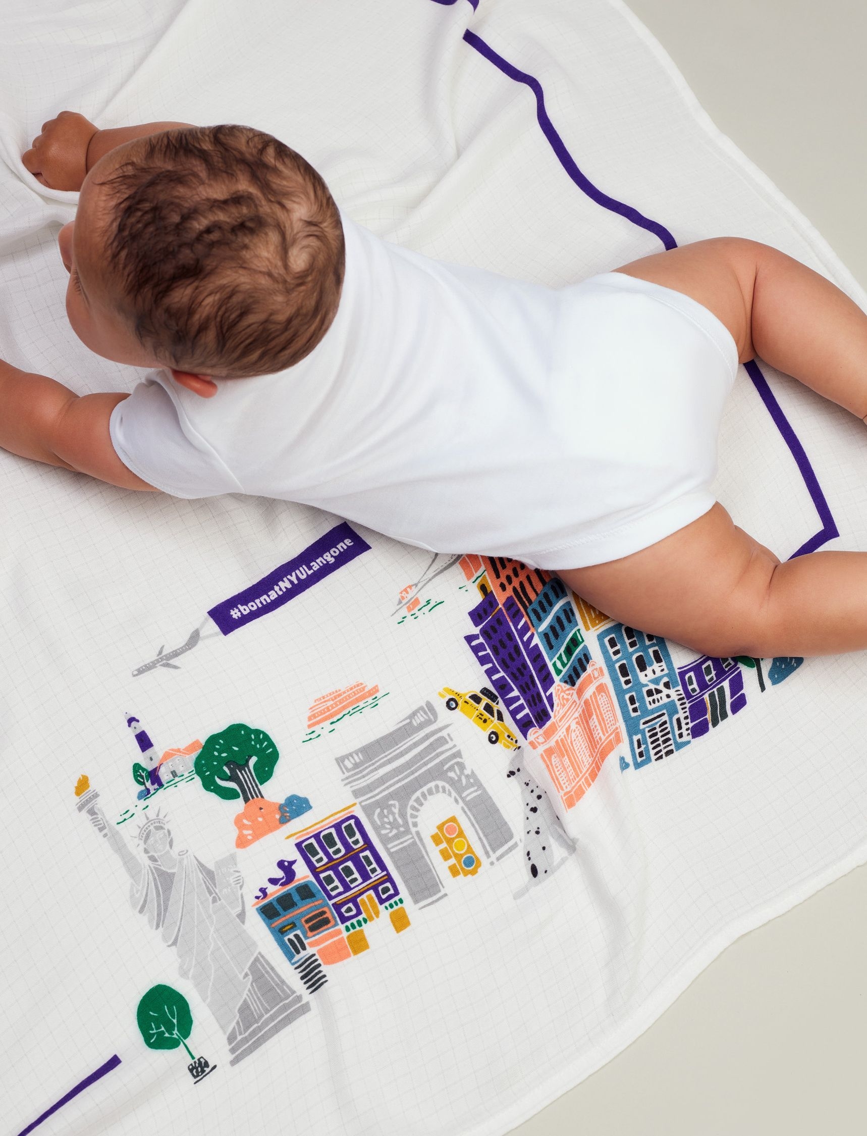 Branded merchandise created by Twelve for NYU; baby blanket